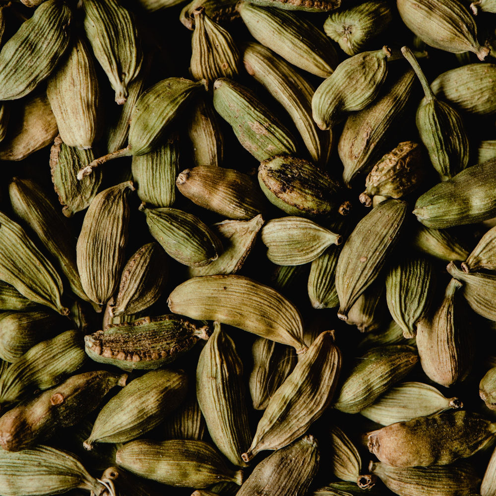 
                      
                        close up of dried cardamom pods
                      
                    