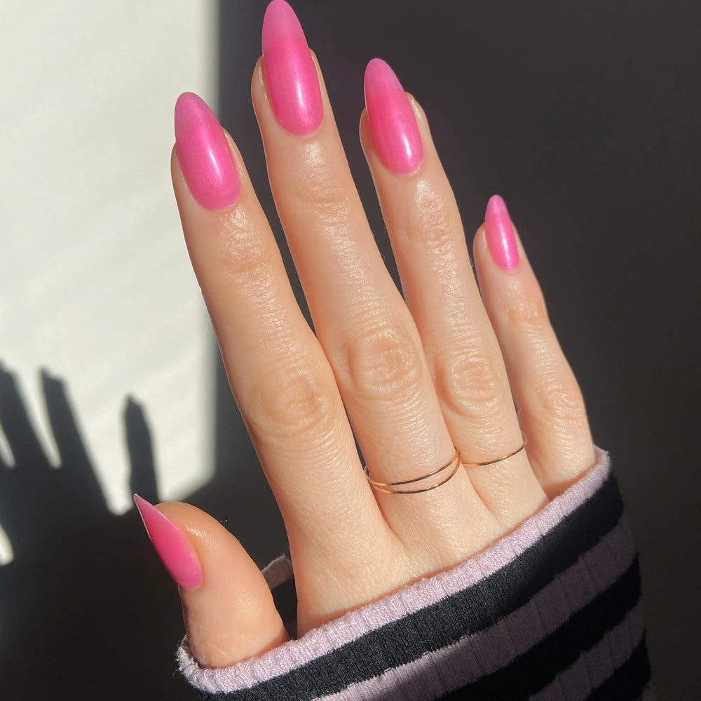 
                      
                        "Sweet n Low" nail polish shown on model's hand.
                      
                    