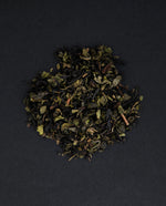 small pile of "casablanca" tea viewed from above against a black background