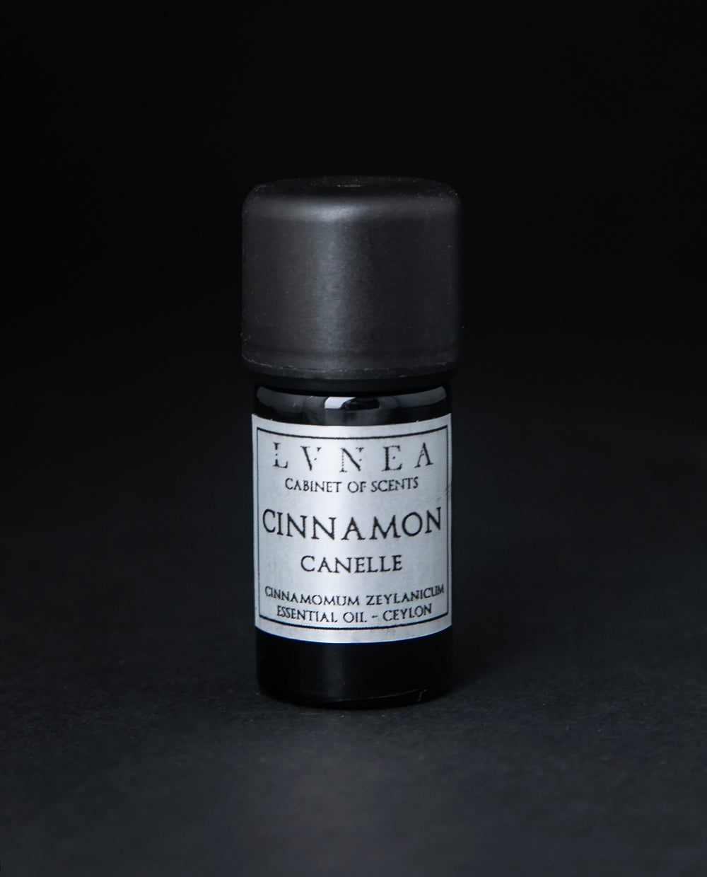 5ml black glass bottle with silver label of LVNEA's cinnamon essential oil