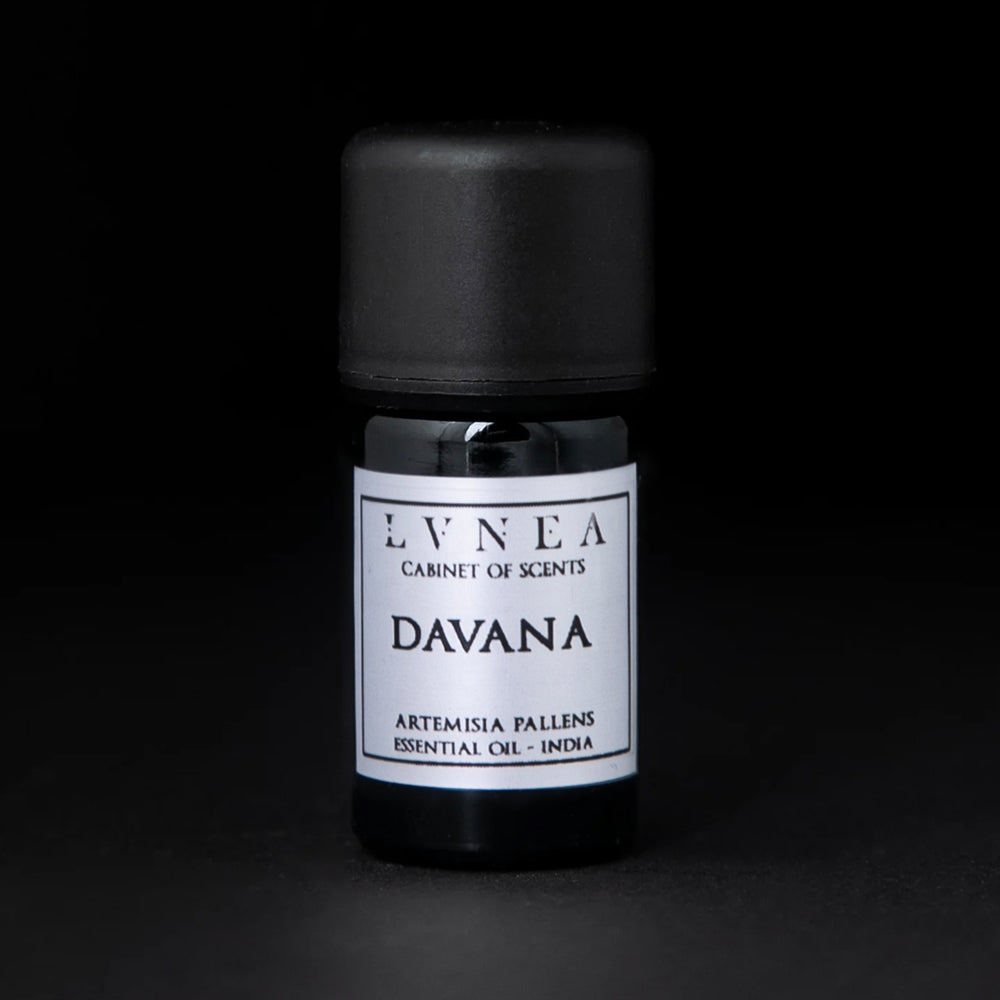 
                      
                        5ml black glass bottle of Davana essential oil against a black background
                      
                    