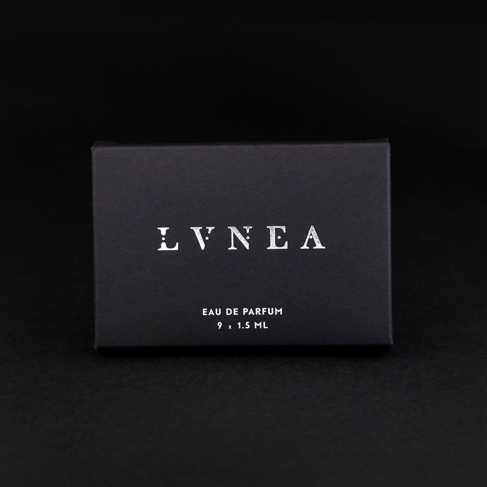 Black cardboard box containing all 9 LVNEA Eau de Parfum sample vials