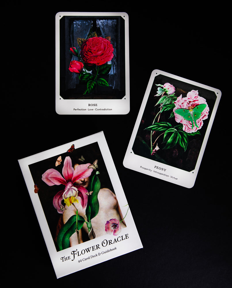 Open box of the "Flower Oracle Deck, revealing a booklet inside
