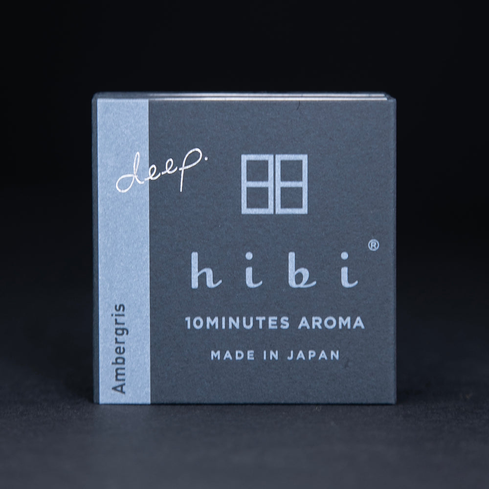 dark slate grey paper box containing HIBI "ambergris" incense matches