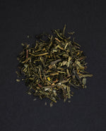 small pile of "iskandar" tea viewed from above against a black background