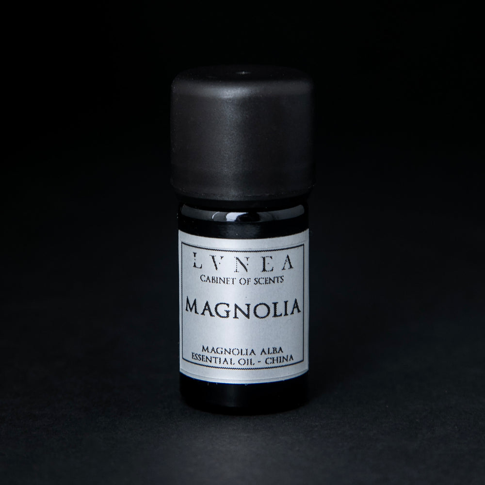 
                      
                        5ml black glass bottle of LVNEA's magnolia essential oil on black background. The label on the bottle is silver.
                      
                    