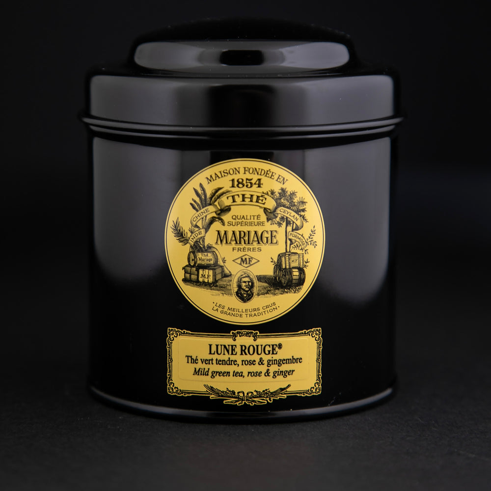 
                      
                        100g black laquered metal canister of Mariage Frère's "Lune Rouge" tea blend on black background.
                      
                    