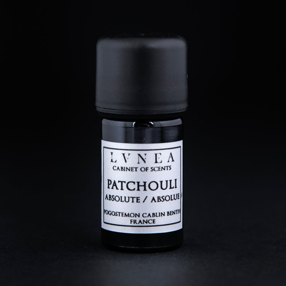 
                      
                        5ml black glass bottle of patchouli absolute on black background
                      
                    