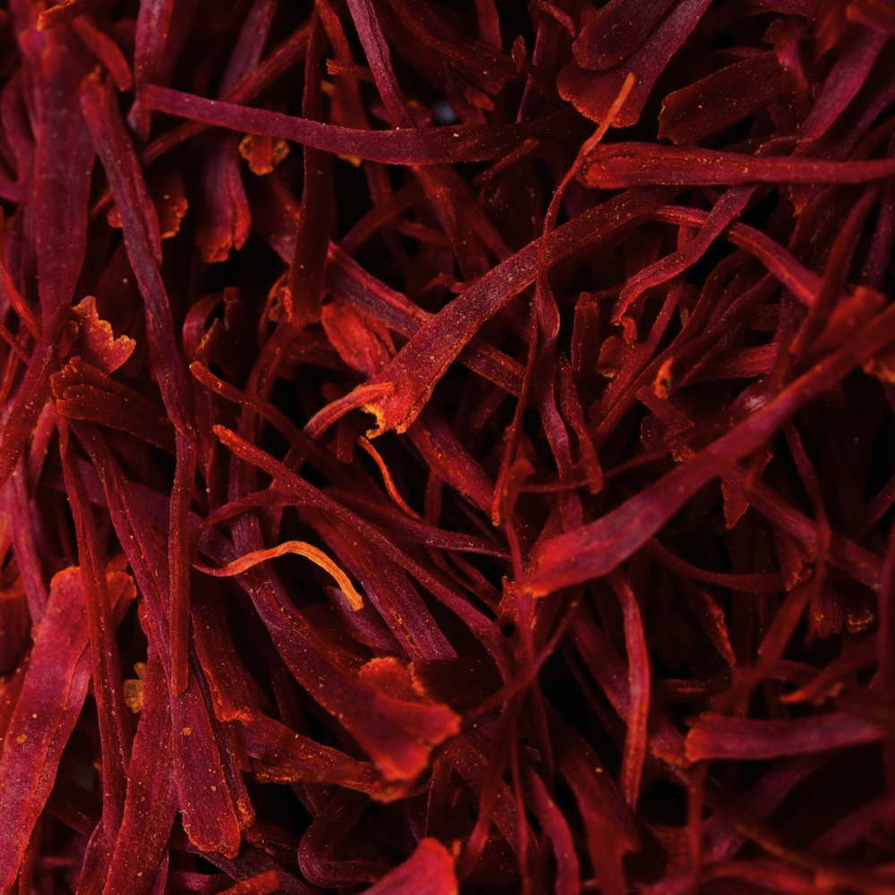 
                      
                        close up of bright red saffron threads
                      
                    