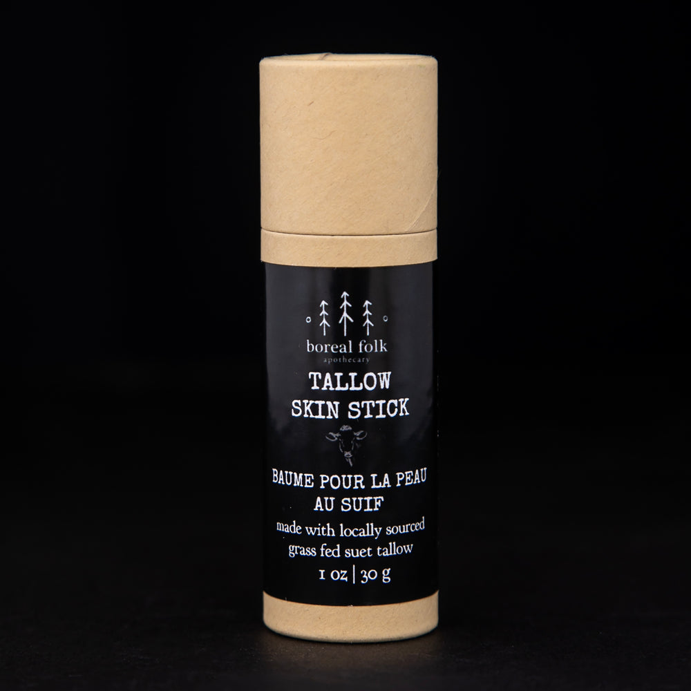 1 oz tallow skin stick presented in a natural cardboard pushup tube