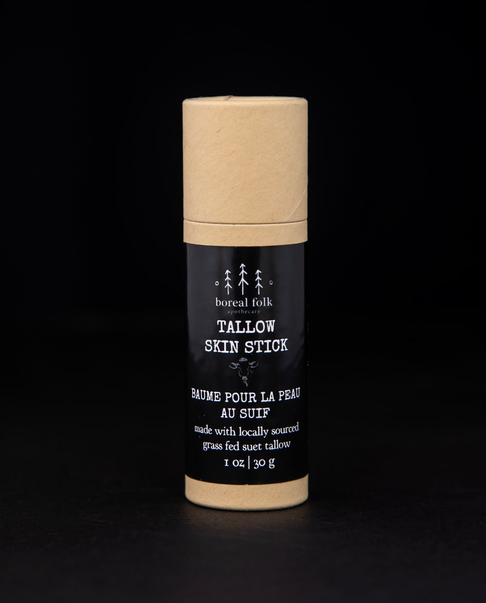 1 oz tallow skin stick presented in a natural cardboard pushup tube