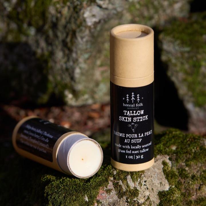 
                      
                        tallow skin stick sitting on mossy rocks
                      
                    