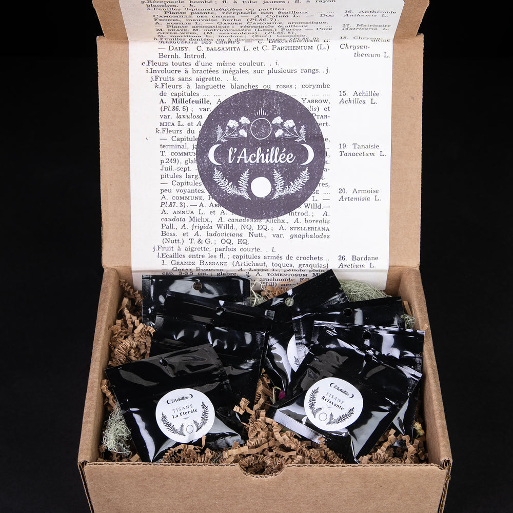 
                      
                        open l'Achillée tea tasting giftbox, revealing 8 small tea sample bags
                      
                    