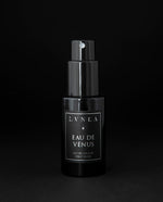 50ml black glass bottle of LVNEA’s Eau de Venus natural fragrance on black background