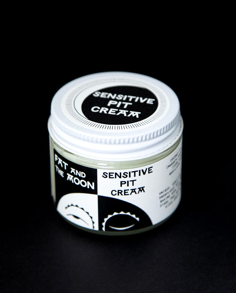 clear glass pot of Fat and the Moon's "Sensitive Pit Cream" deodorant 